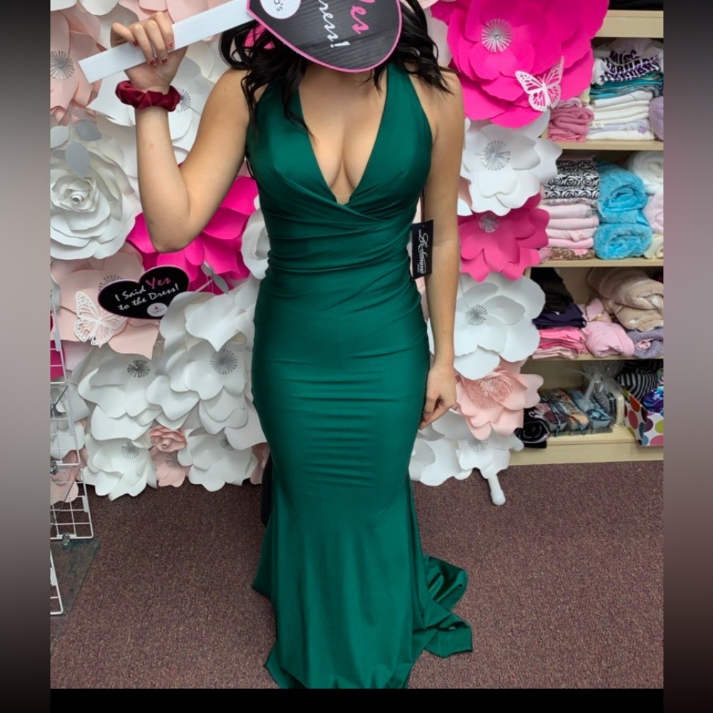 Never worn nor altered! Brand new